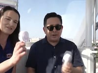 CBS Mornings give out hand-held fans to correspondent Ed O'Keefe and guest Taylor Talley who are riding the State Fair's ferris wheel in 100 degree heat.