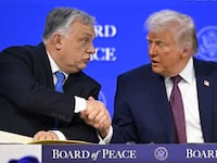 Hungary's Prime Minister Viktor Orban (L) shakes hands with US President Donald Trump (C) at the "Board of Peace" meeting during the World Economic Forum (WEF) annual meeting in Davos on January 22, 2026. US President Donald Trump will show off his new "Board of Peace" at Davos on January 22, 2026 burnishing his claim to be a peacemaker a day after backing off his own threats against Greenland. Originally meant to oversee the rebuilding of Gaza after the war between Hamas and Israel, the board's charter does not limit its role to the Strip, and has sparked concerns that Trump wants it to rival the United Nations. (Photo by Fabrice COFFRINI / AFP via Getty Images)