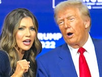 Donald Trump speaks with moderator Kristi Noem during a town hall at the Greater Philadelphia Expo Center and Fairgrounds in Oaks, Pennsylvania, on October 14, 2024.