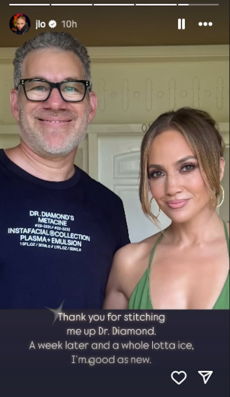 A photo of Jennifer Lopez and a man wearing a t-shirt that says "Dr. Diamond."