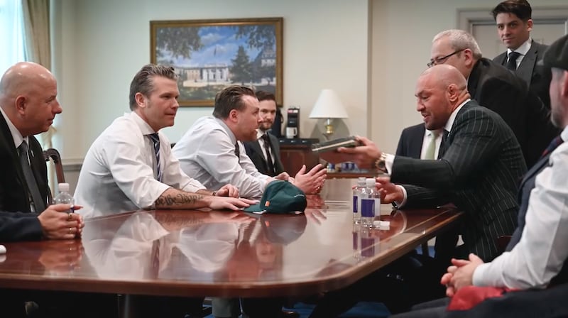 Phil Hegseth (center left) during Pete Hegseth's meeting with MMA fighter Conor McGregor at the Pentagon.