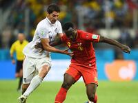 articles/2014/07/01/team-usa-is-valiant-to-the-end-in-2-1-world-cup-loss-to-belgium/140701-tunku-wc-us-tease_rixv6u