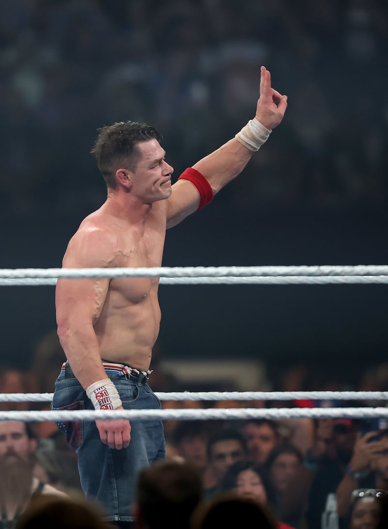 EAST RUTHERFORD, NEW JERSEY - AUGUST 03: John Cena takes a moment to salute the fans after the loss to Cody Rhodes during the WWE 2025 SummerSlam at MetLife Stadium on August 03, 2025 in East Rutherford, New Jersey. (Photo by Elsa/Getty Images)