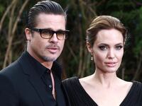 Brad Pitt and Angelina Jolie attend a private reception as costumes and props from Disney's "Maleficent" are exhibited in support of Great Ormond Street Hospital at Kensington Palace on May 8, 2014 in London, England.