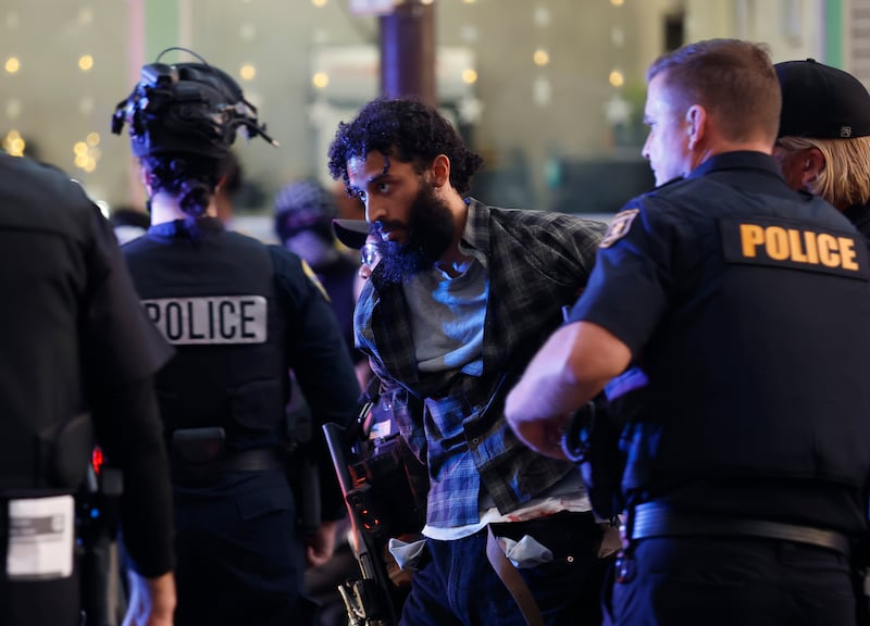BERKELEY, CALIFORNIA - NOVEMBER 10: Berkeley police arrest a protester outside of a Turning Point USA event at the University of California, Berkeley (UC Berkeley) on November 10, 2025 in Berkeley, California. Two months after Turning Point USA founder Charlie Kirk was killed, the tour made a stop in California at UC Berkeley. (Photo by Justin Sullivan/Getty Images)
