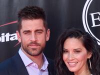 Aaron Rodgers says Olivia Munn was not to blame for family rift, says book.