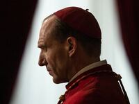 Ralph Fiennes stars as Cardinal Lawrence