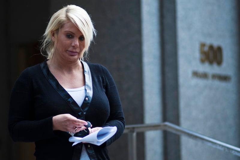 articles/2013/08/07/kristin-davis-self-styled-spitzer-madam-is-arraigned-on-drug-charges/130806-kristin-davis-arrest-daly-tease_w8tmgj