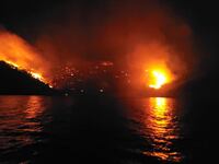 A general view of a forest fire on the island of Hydra, Greece June 21, 2024.