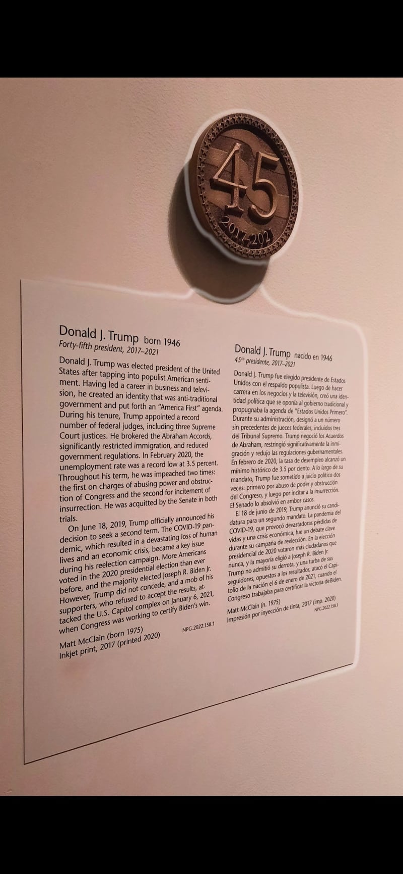 An image of the old description accompanying Trump's portrait in the gallery.