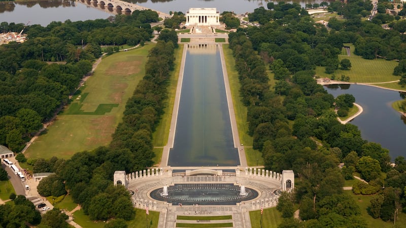 Algae can be seen at the bottom of the reflecting pool in this June aerial image.