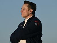 TOPSHOT - Elon Musk steps off Air Force One upon arrival at Morristown Municipal Airport in Morristown, New Jersey, on March 22, 2025. US President Donald Trump will be spending the weekend at Trump National Golf Club in Bedminster, New Jersey. (Photo by Brendan SMIALOWSKI / AFP) (Photo by BRENDAN SMIALOWSKI/AFP via Getty Images)