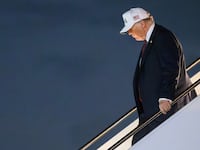 US President Donald Trump steps off Air Force One at Palm Beach International Airport in West Palm Beach, Florida, on February 27, 2026. Trump is spending the weekend at his Mar-a-Lago resort. (Photo by Mandel NGAN / AFP via Getty Images)