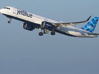 A JetBlue passenger was arrested after allegedly opening an emergency exit and deploying the slide of a taxiing aircraft at Boston Logan International Airport.