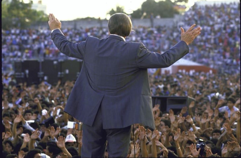 TV evangelist Jimmy Swaggart holding huge crowd spellbound, preaching at Flora Blanca Stadium. (Photo by Cindy Karp/Getty Images)