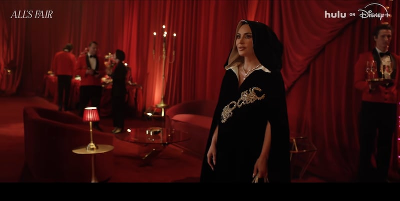 Kim Kardashian wears the scorpion cloak in the second season of her legal drama “All’s Fair.”
