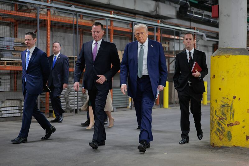 President Donald Trump and Richard Grenell, President of The Kennedy Center Board of Trustees, take a guided tour of the John F. Kennedy Center for the Performing Arts before leading a board meeting on March 17, 2025 in Washington, DC.