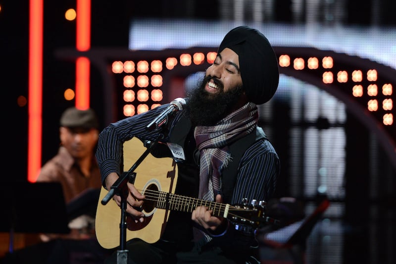 articles/2013/02/14/american-idol-s-gurpreet-singh-sarin-on-singing-his-way-past-stereotypes/130213-Singh-Sikh-American-Idol-tease_okfbmk