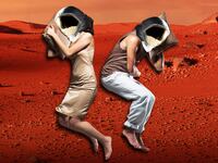 image of two people sleeping in silk pajamas with astronaut head gear with mars in the background red planet hibernation torpor passengers jennifer lawrence chris pratt sleep pod