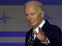 President Joe Biden waves at a NATO event to commemorate the 75th anniversary of the alliance, in Washington, D.C., July 9, 2024.