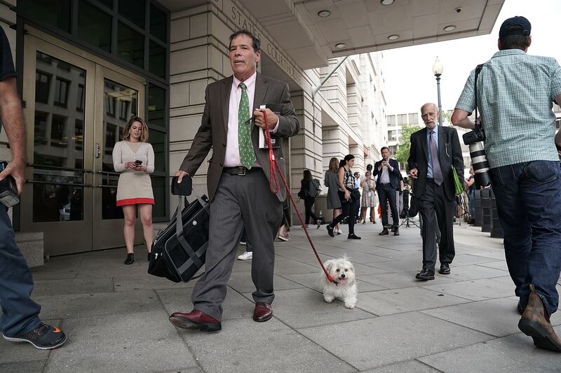 Randy Credico and his dog Bianca leave court in September 2018 after Credico testified before special counsel Robert Mueller's grand jury.