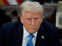 President Donald Trump talks to reporters in the Oval Office on January 31, 2025 in Washington, DC.