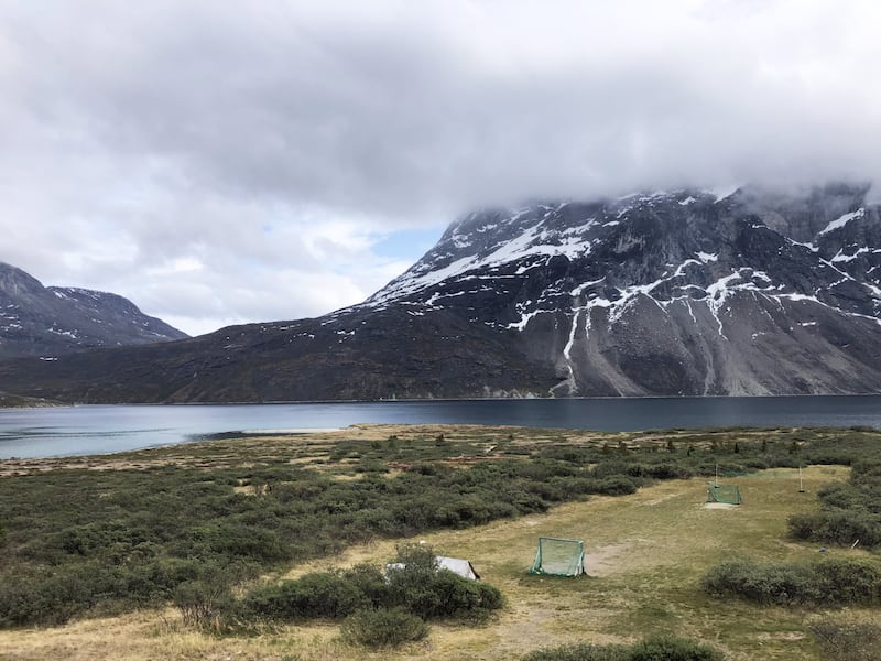 A photograph of a football pitch at the end of the world in Greenland.