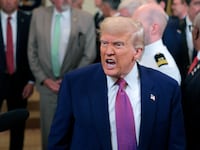 President Donald Trump responds to a reporters question as he leaves after signing a series of bills related to California’s vehicle emissions standards during an event in the East Room of the White House on June 12, 2025 in Washington, DC.