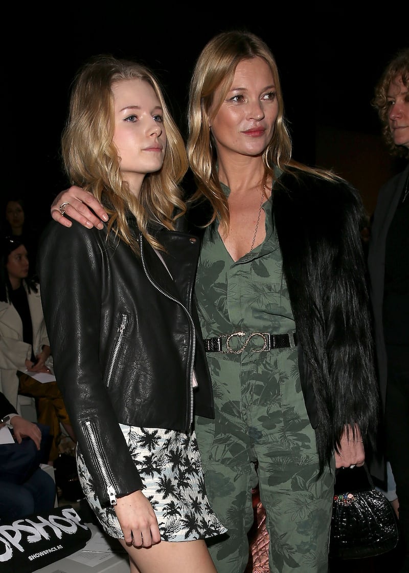 Sisters Lottie and Kate Moss at London Fashion Week on February 16, 2014, in London, England.