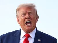 JOINT BASE ANDREWS, MARYLAND - JULY 22: U.S. President Donald Trump calls out to reporters after getting off Air Force One on July 22, 2026 at Joint Base Andrews, Maryland. Trump is returning from attending a dignified transfer at Dover Air Force Base and a rally in Georgia. (Photo by Kevin Dietsch/Getty Images)