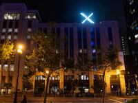 X logo is seen on the top of the headquarters of the messaging platform X, formerly known as Twitter.