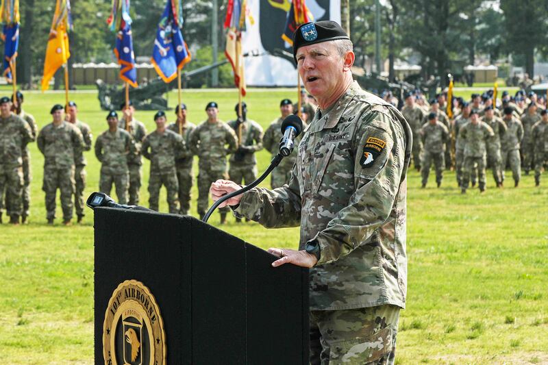 Maj. Gen. JP McGee, commanding general of the 101st Airborne Division (Air Assault), delivers remarks during a division Pass in Review, May 25, 2023, at the division parade field, Fort Campbell, Kentucky.