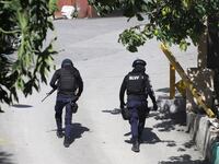 2021-07-07T235820Z_2131291896_RC2RFO9J5JM4_RTRMADP_3_HAITI-PRESIDENT_z5x586