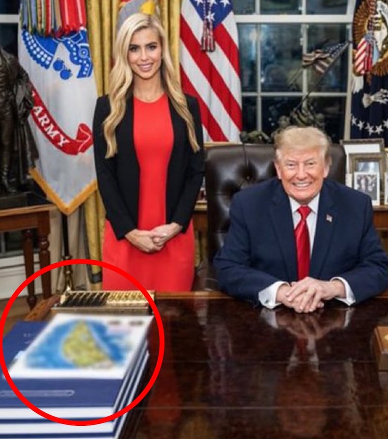 Katie Zacharia poses with Donald Trump and her family.