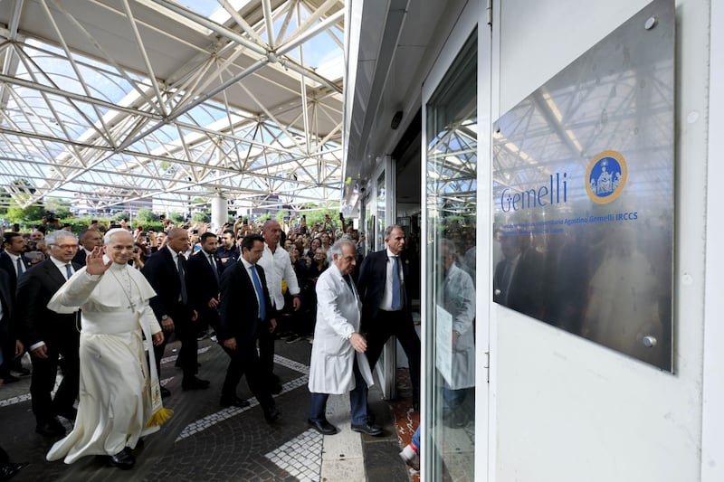 Pope Leo XIV greets faithful as he arrives at Gemelli Hospital on October 13, 2026 in Rome, Italy.