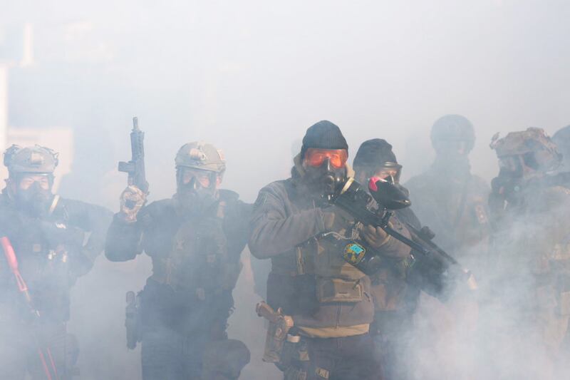 MINNEAPOLIS, MN. - JANUARY 2026: Federal agents attempt to control a growing crowd on Nicollet Avenue in south Minneapolis after Alex Pretti was fatally shot by federal agents in the area early Saturday morning, January 24, 2026. (Photo by Richard Tsong-Taatarii/The Minnesota Star Tribune)