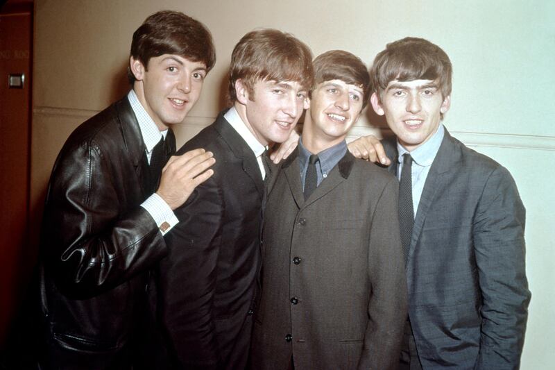 1963: Rock and roll band "The Beatles" pose for a portrait in 1963. (Photo by Michael Ochs Archives/Getty Images)
