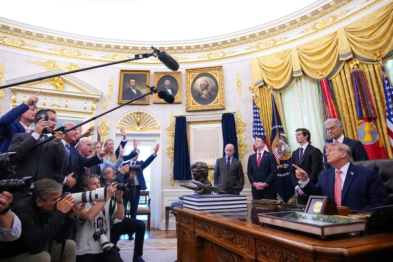 Trump repeatedly lost his cool with Feinberg, seen here beneath the right edge of the doorframe.