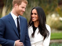 Britain's Prince Harry poses with Meghan Markle in the Sunken Garden of Kensington Palace, London, Britain, November 27, 2017.