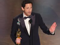 Adrien Brody accepts the Best Actor In A Leading Role award for "The Brutalist" onstage during the 97th Annual Oscars