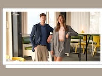 American Tall models wearing clothes made for tall men and women.