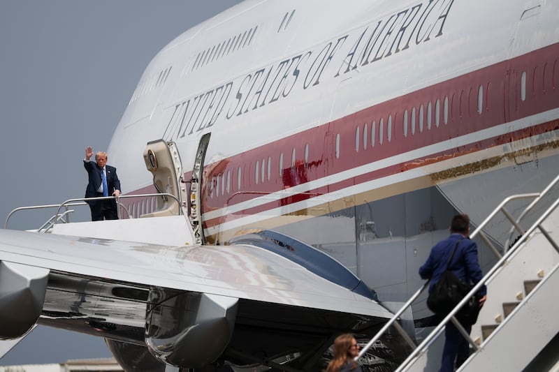 HOUSTON, TEXAS - AUGUST 28: U.S. President Donald Trump waves as he boards Air Force One at Ellington Airport on August 28, 2026 in Houston, Texas. President Trump is returning to Washington, DC following a ceremony honoring Artemis II crew members at NASA's Johnson Space Center. (Photo by Win McNamee/Getty Images)