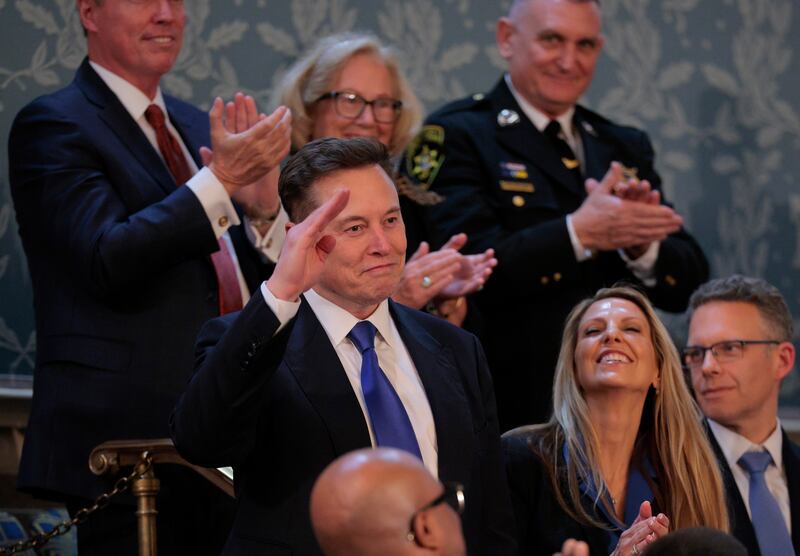 Elon Musk stands after being recognized by U.S. President Donald Trump while addressing a joint session of Congress at the U.S. Capitol on March 04, 2025 in Washington, DC.
