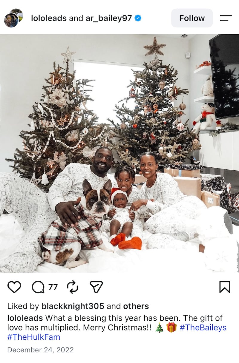 Allen Bailey and his wife, Lauren Bailey, seem to be pictured with their two children and family dog for Christmas in 2022.