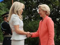 European Commission President Ursula von der Leyen is greeted by U.S. Chief of Protocol Monica Crowley as she arrives at the White House for a meeting with President Donald Trump and Ukrainian President Volodymyr Zelensky on August 18, 2025.