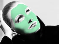 Greta Garbo with a green face mask