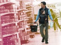 A photo illustration showing a still from The Family Plan starrring Mark Wahlberg.