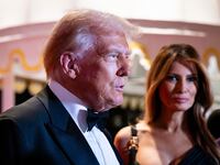 Donald Trump and his wife Melania Trump arrive on New Year's Eve at his Mar-A-Lago Club in Palm Beach, Florida.