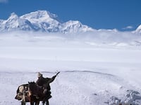Two people are confirmed dead and two are missing after Saturday's avalanche on Mount Shishapangma in Tibet.