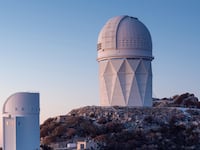 articles/2015/09/23/5-000-robots-will-3d-map-dark-energy/150923-coolman-telescope-tease_i7bdun